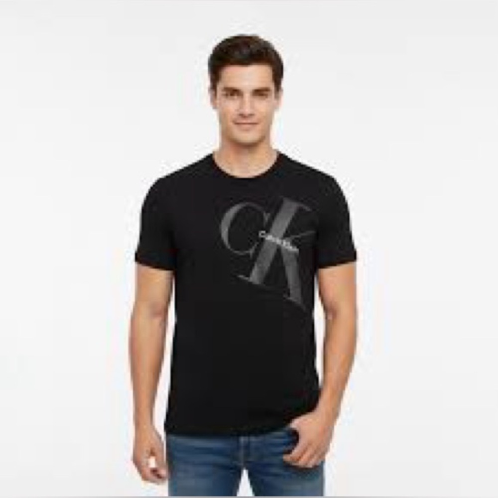 Calvin Klein Monogram  Men’s T-shirt, size XL. This model from Calvin Klein